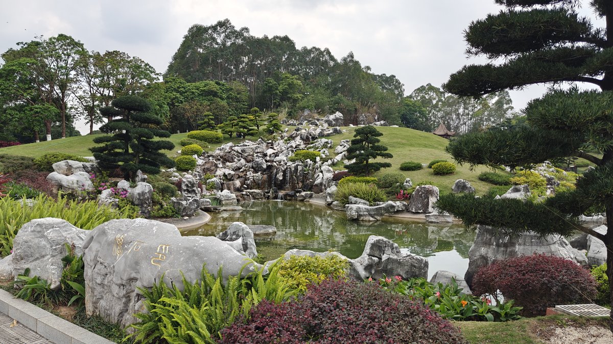 Rock pond with waterfall cascade