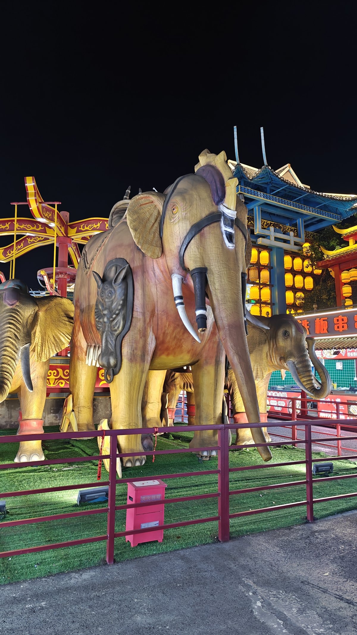 Row of golden elephant statues