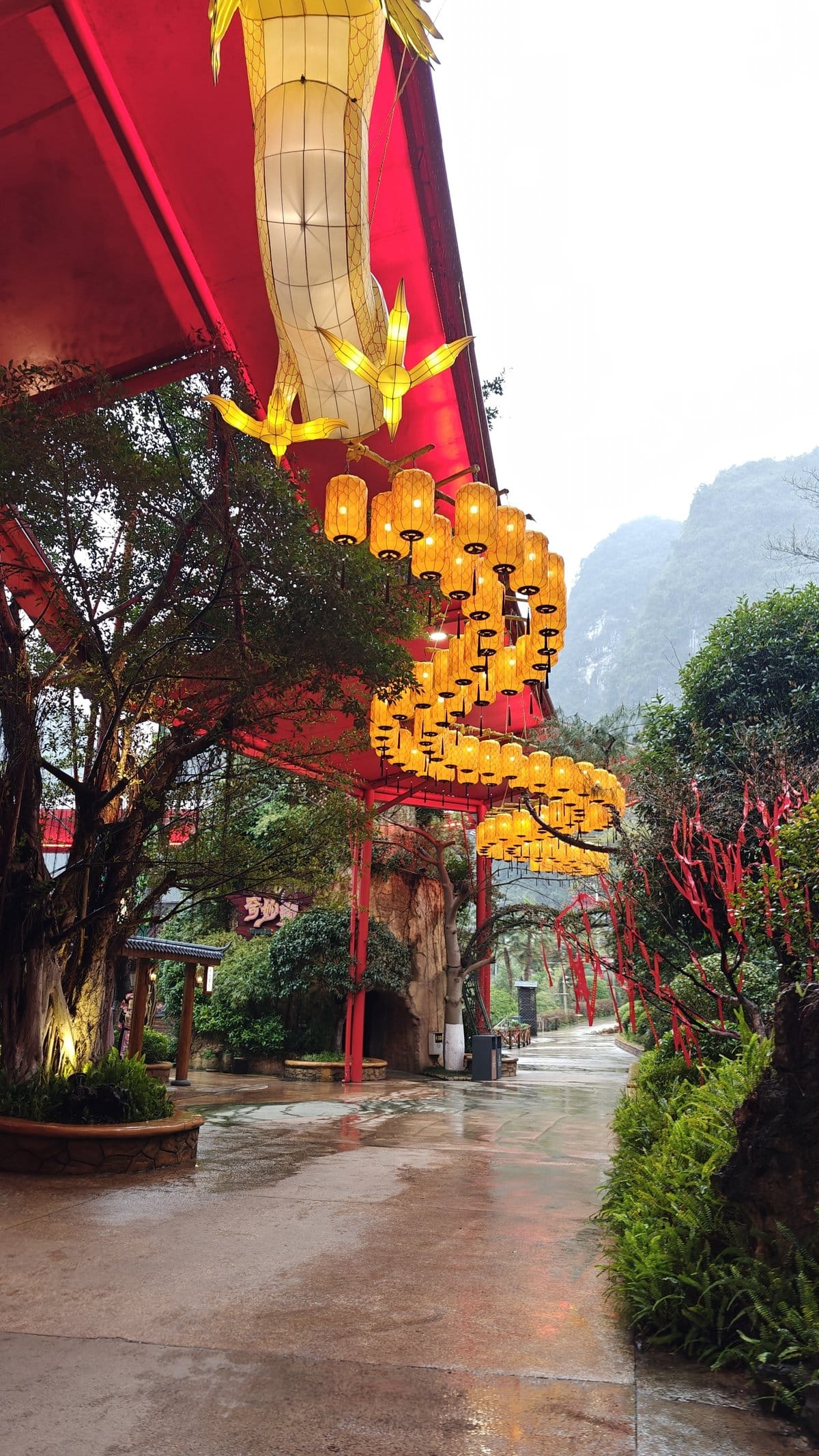 Rows of yellow lanterns walkway