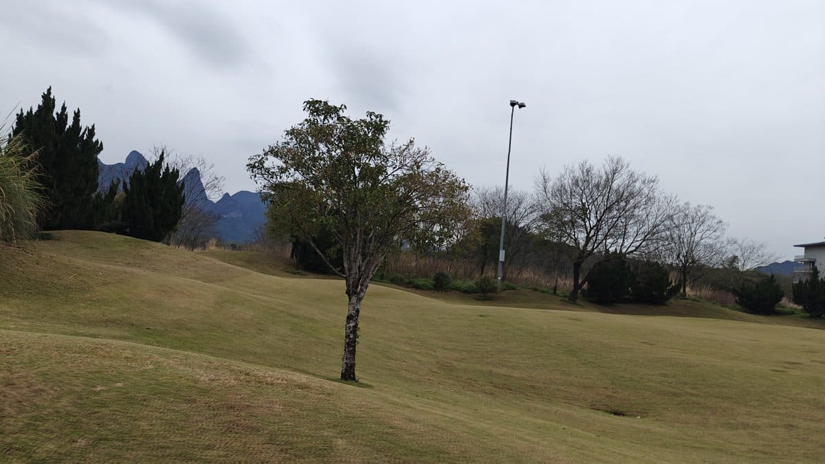 Sand bunkers with mountain backdrop