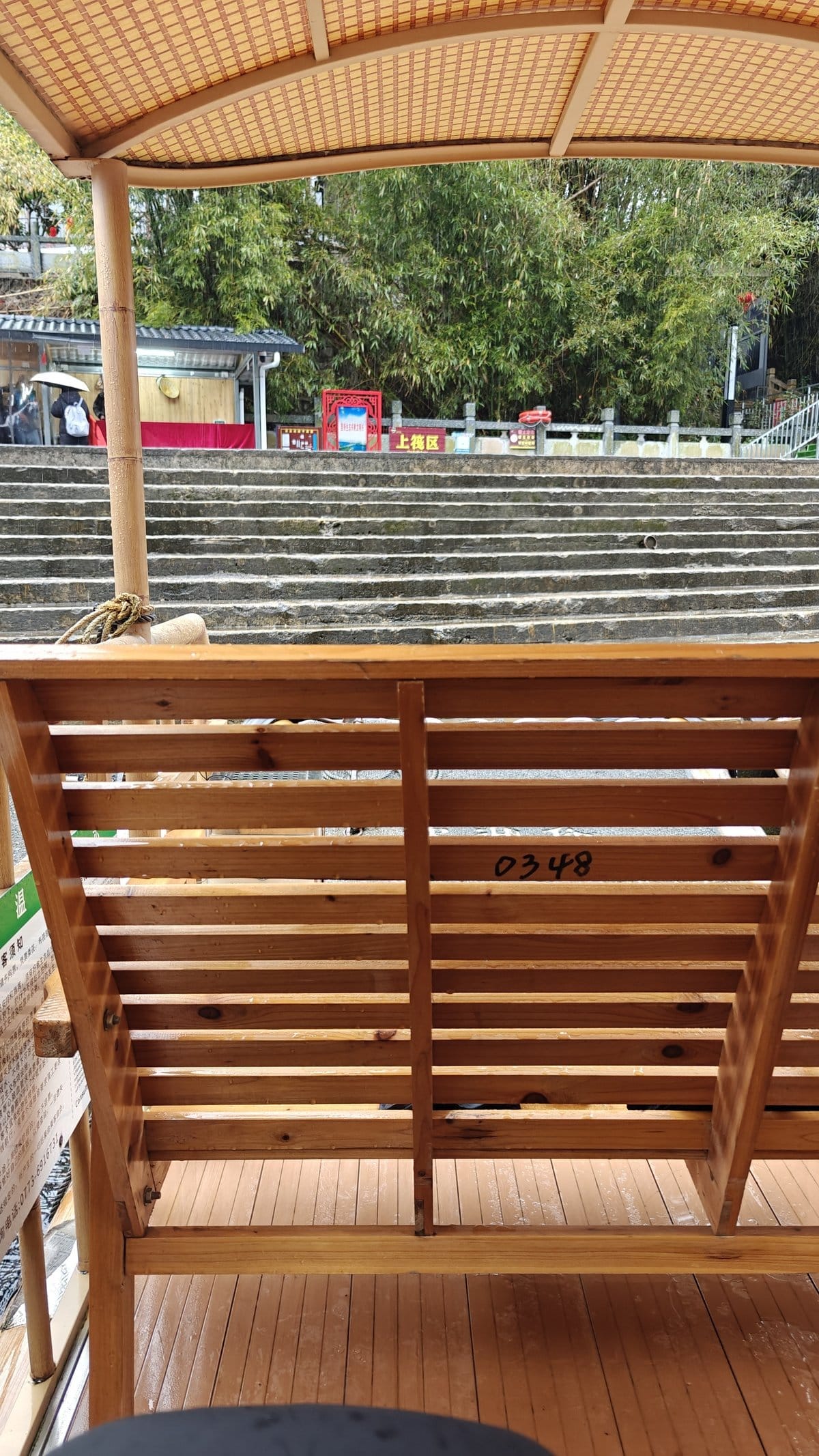 Seated aboard bamboo raft ready