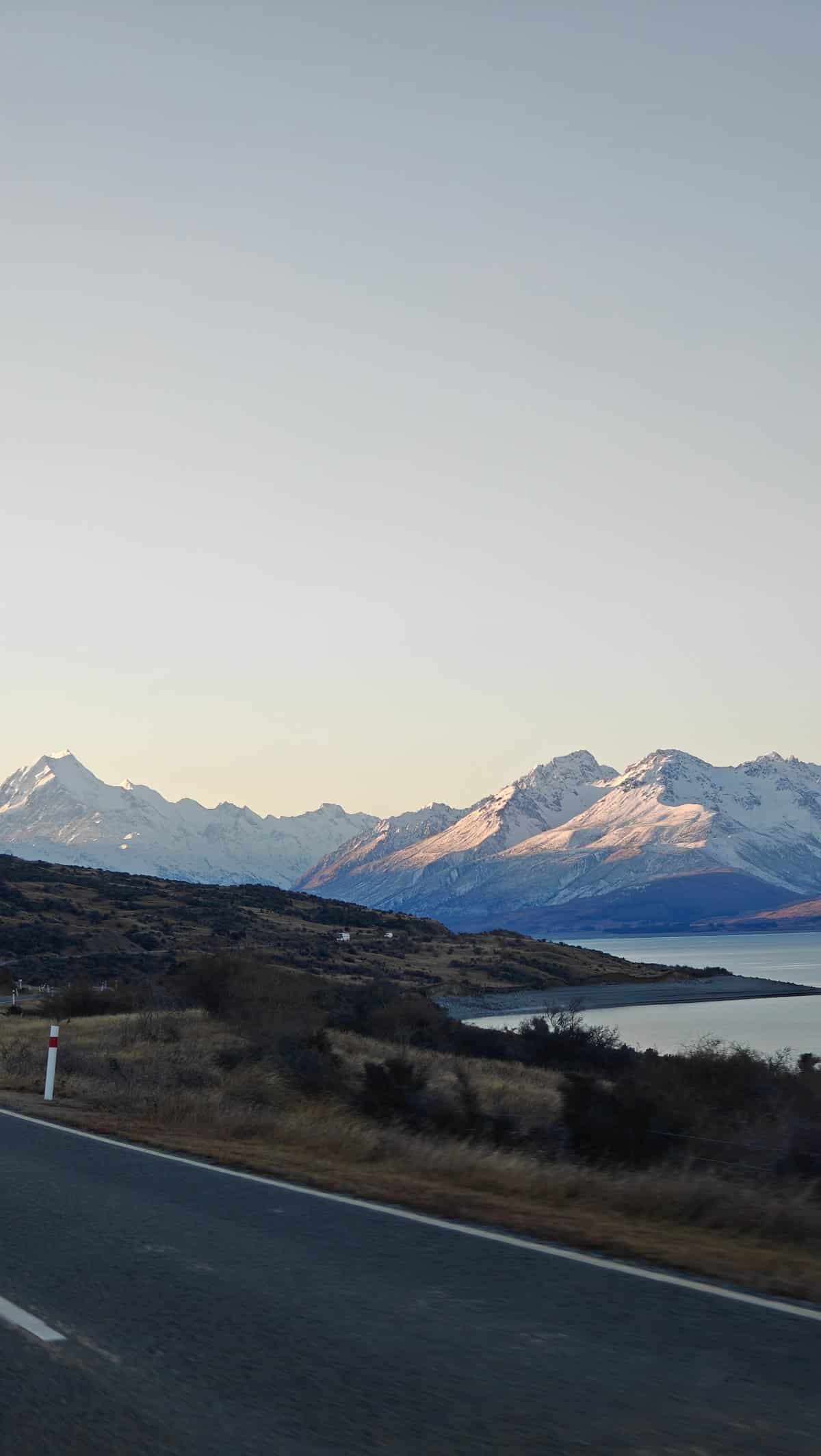 Skirting glacial lake by car