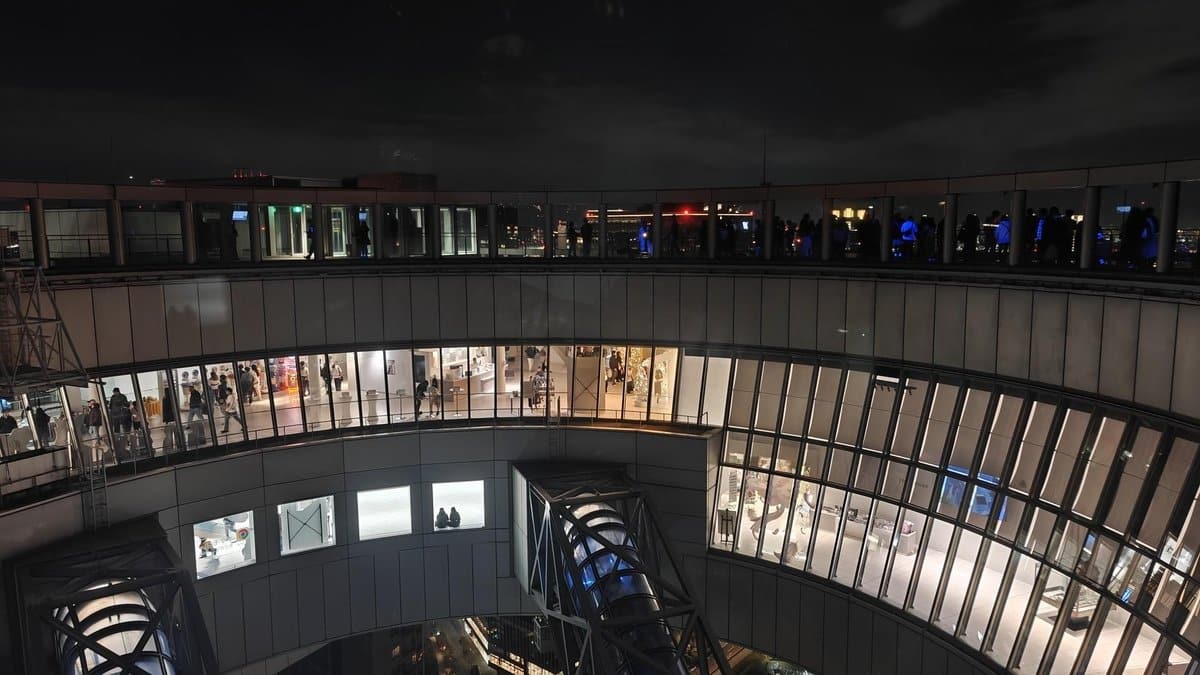 Skywalk with night city view