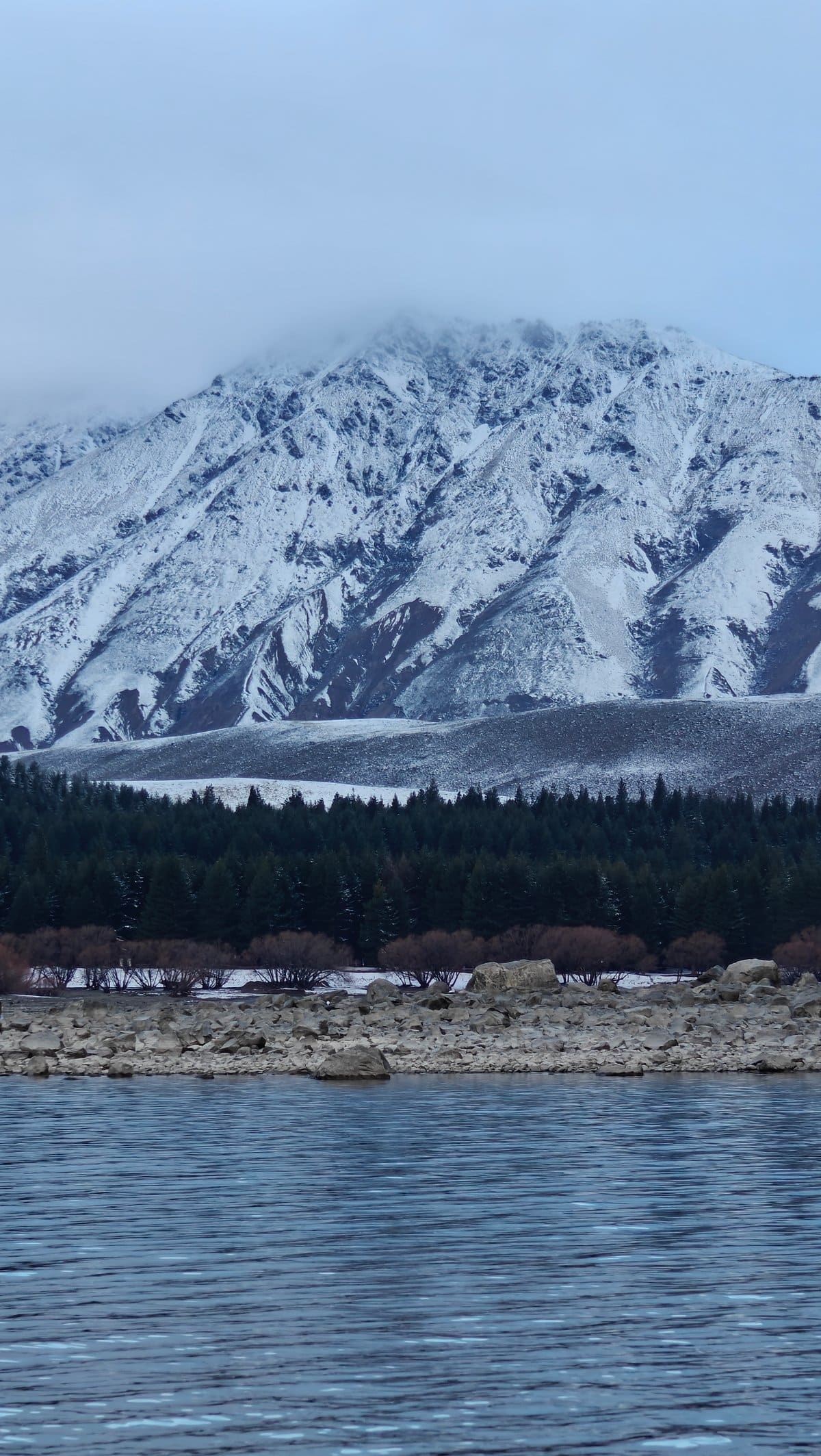 Snow mountain wrapped in cloud
