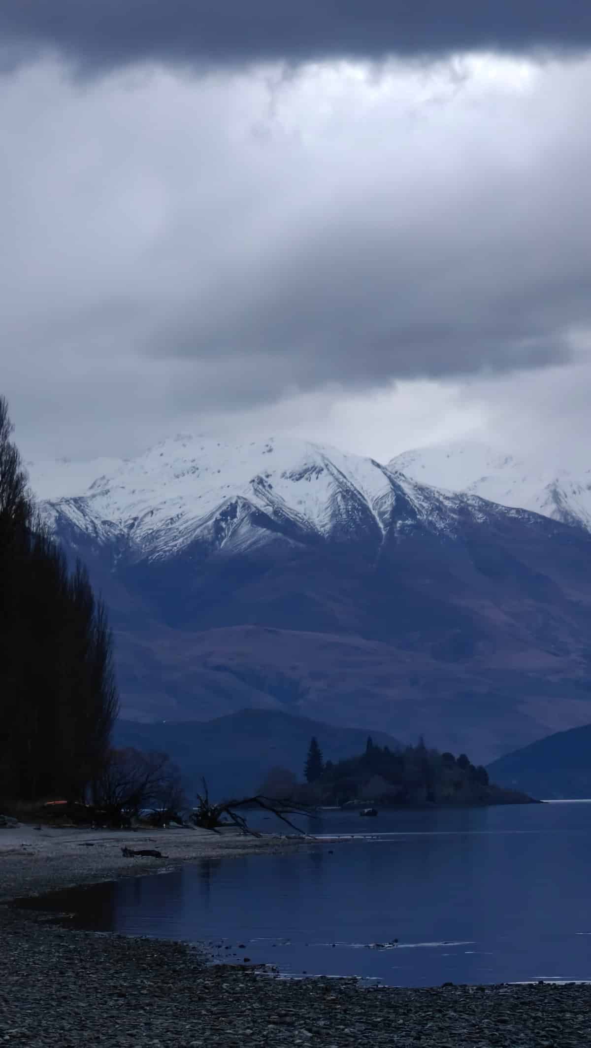 Snow mountains dramatic blue hour