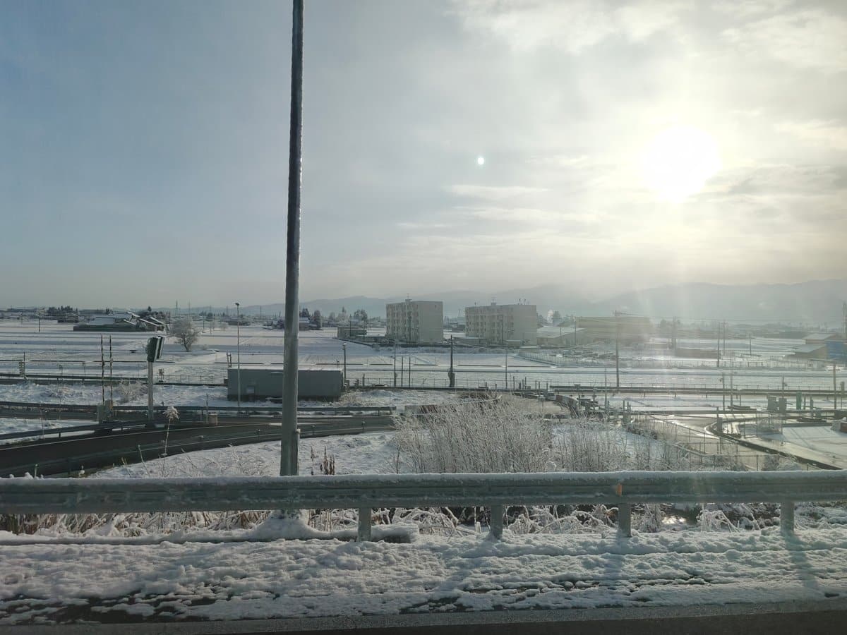 Snowy valley town from approach