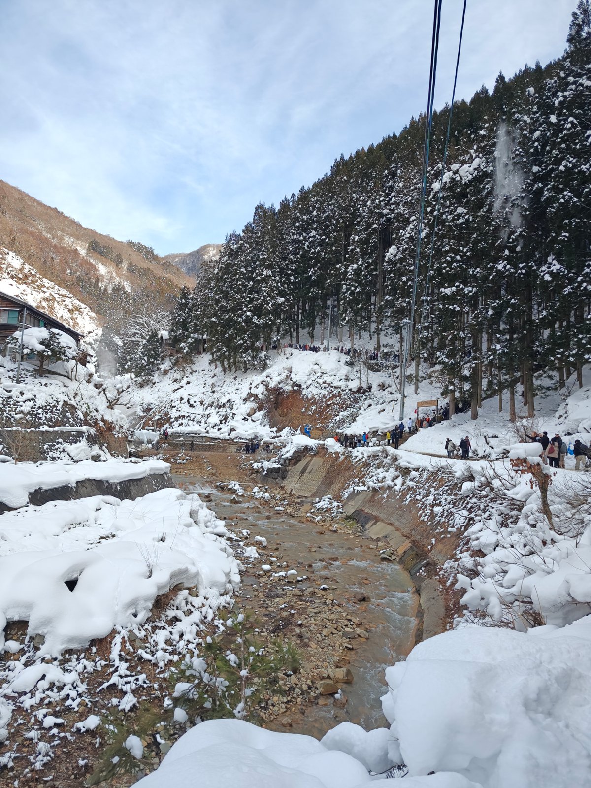 Steaming snowy river gorge