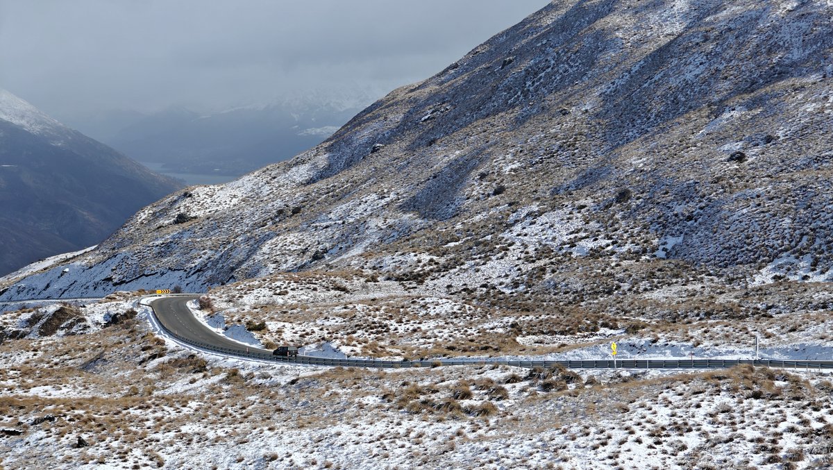 Switchbacks on snowy mountain pass