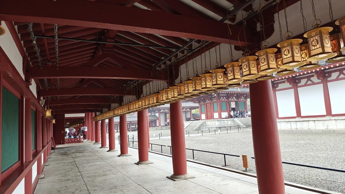 Temple corridor with hanging lanterns