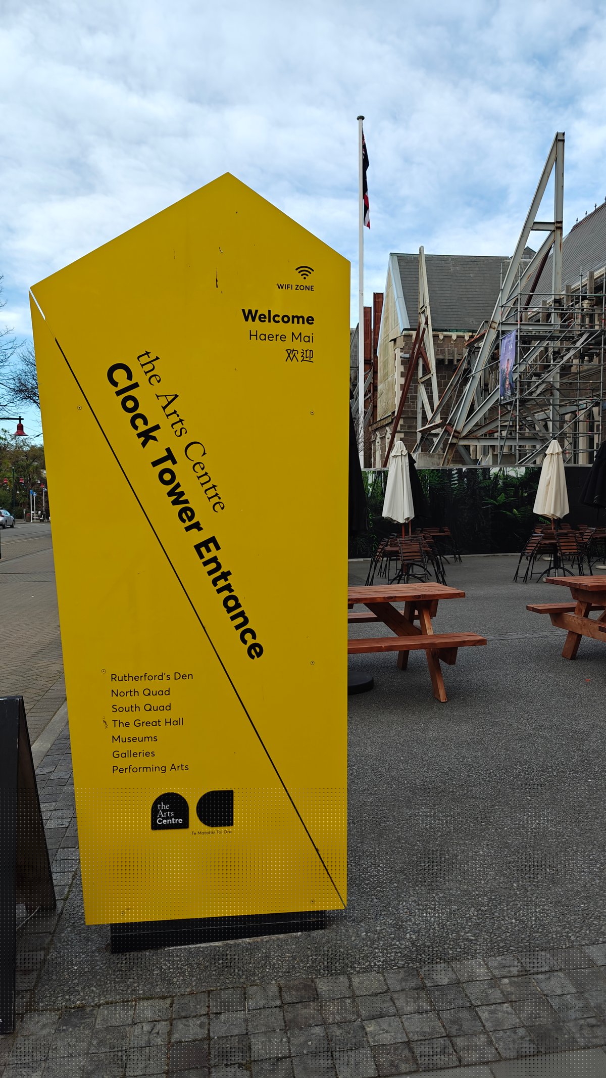 The Arts Centre's tall yellow 'Clock Tower Entrance'