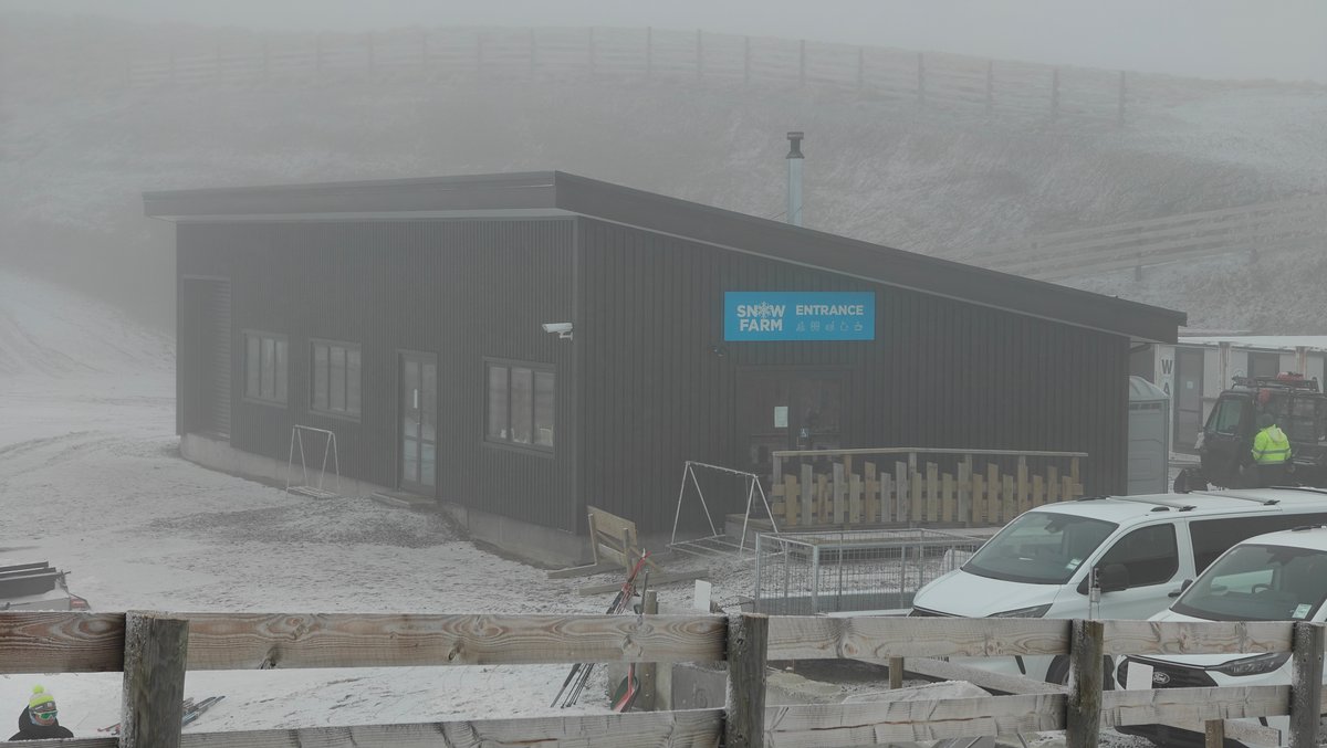 The dark Snow Farm base building looming in