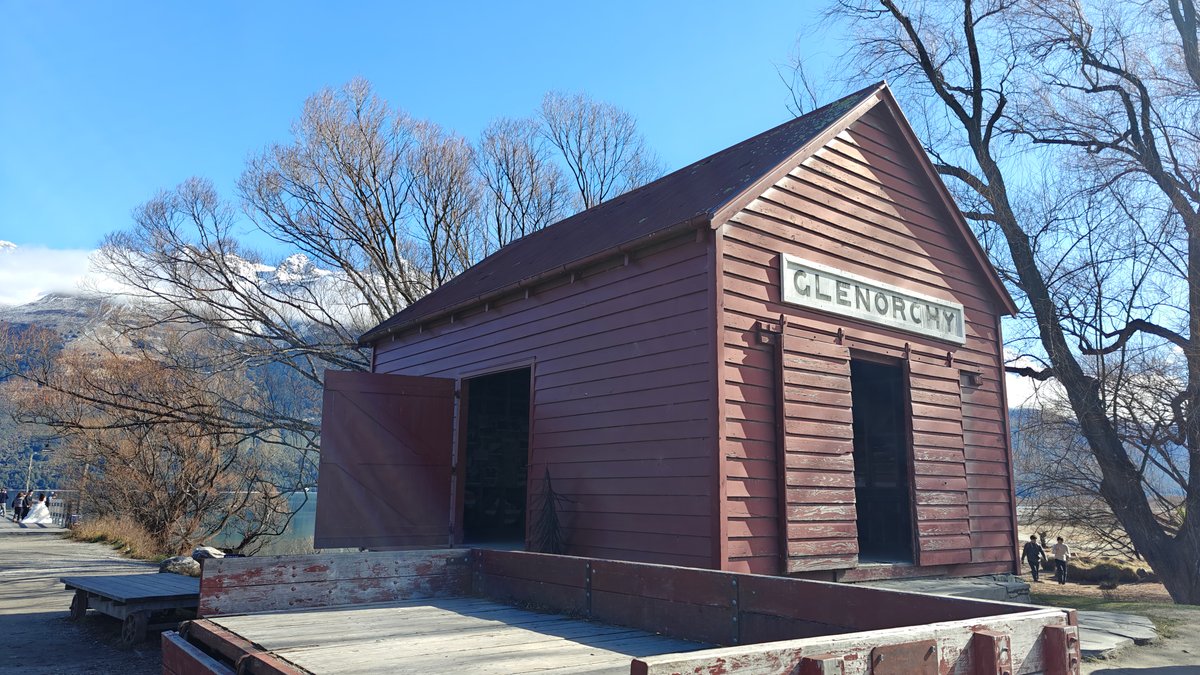 The red 'GLENORCHY' wharf shed with its raised
