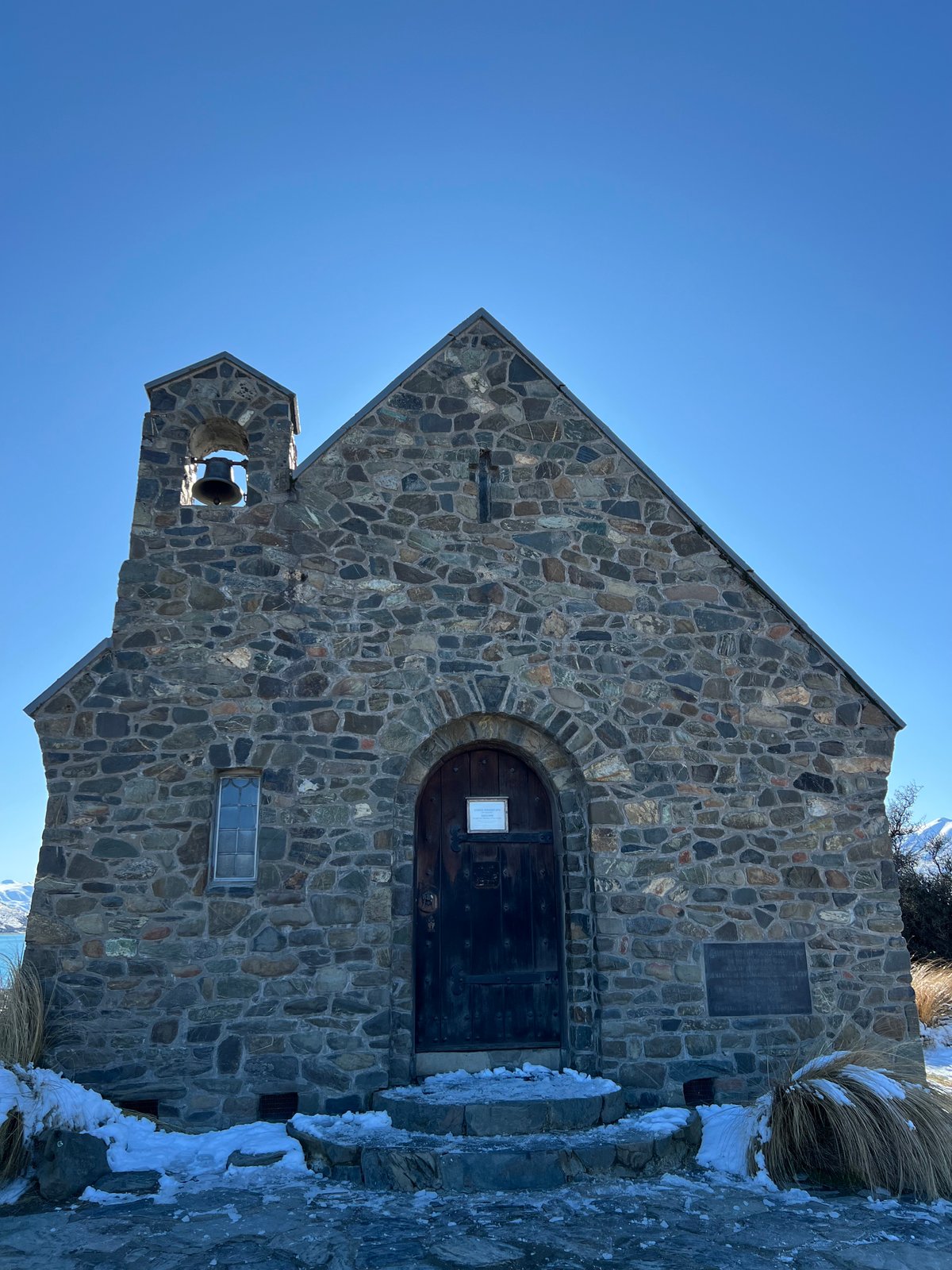 The west (front) facade of the church: rough