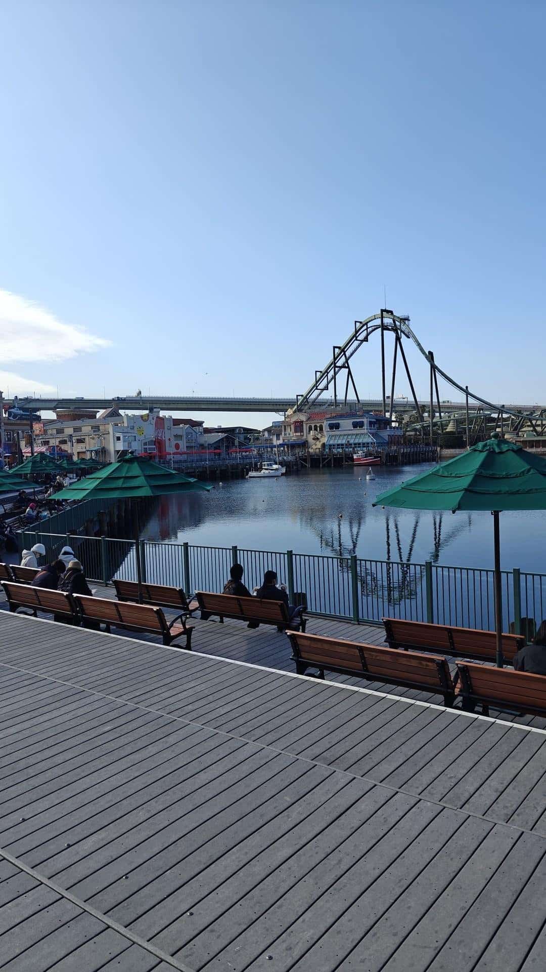 Theme park waterfront with seating