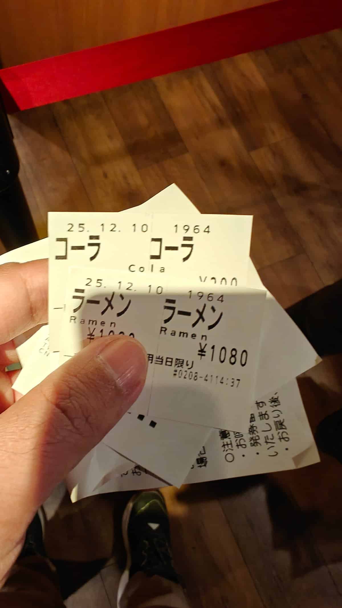 Ticket machine receipts - Cola and Ramen orders