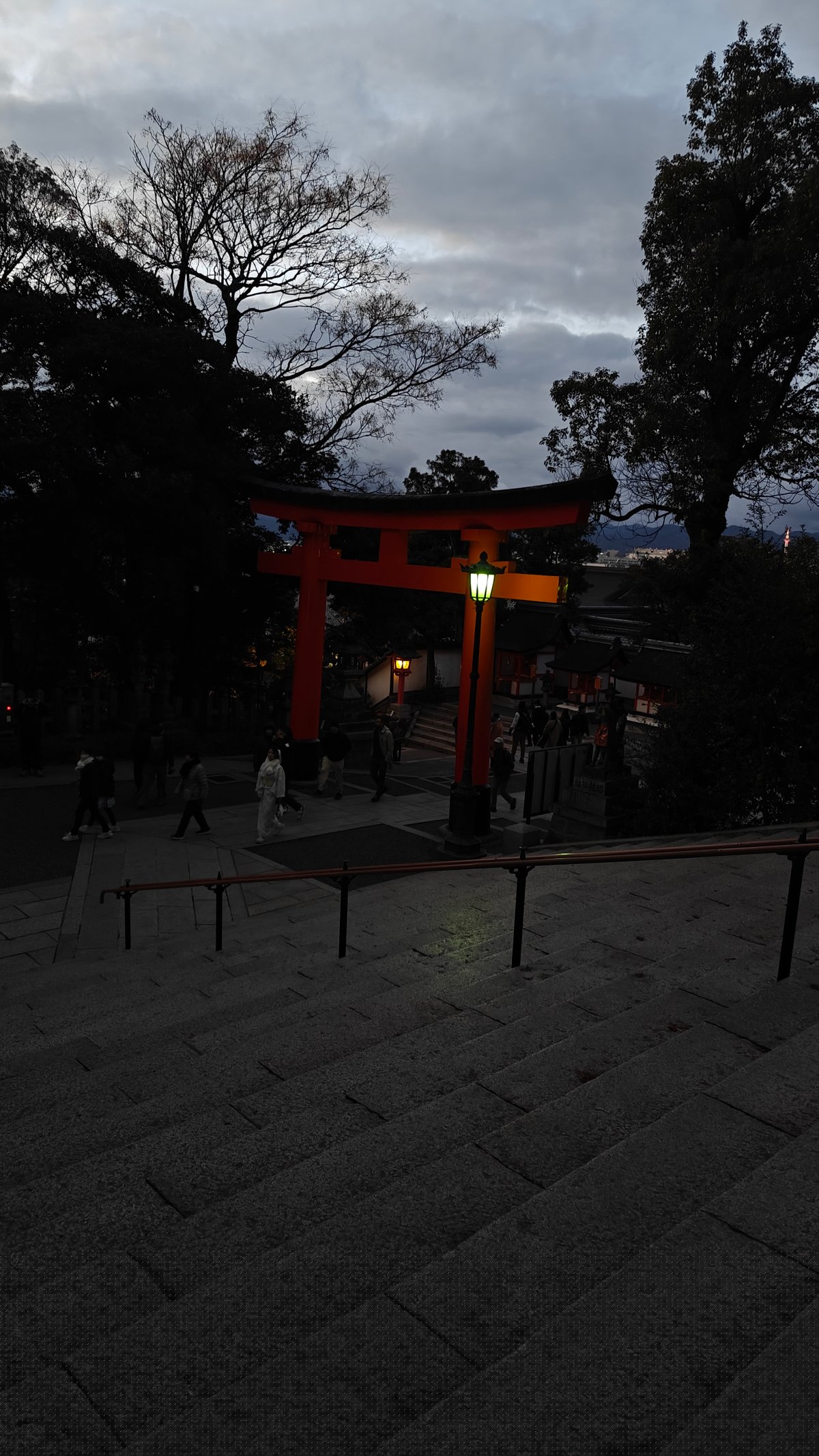 Torii silhouette deep twilight sky