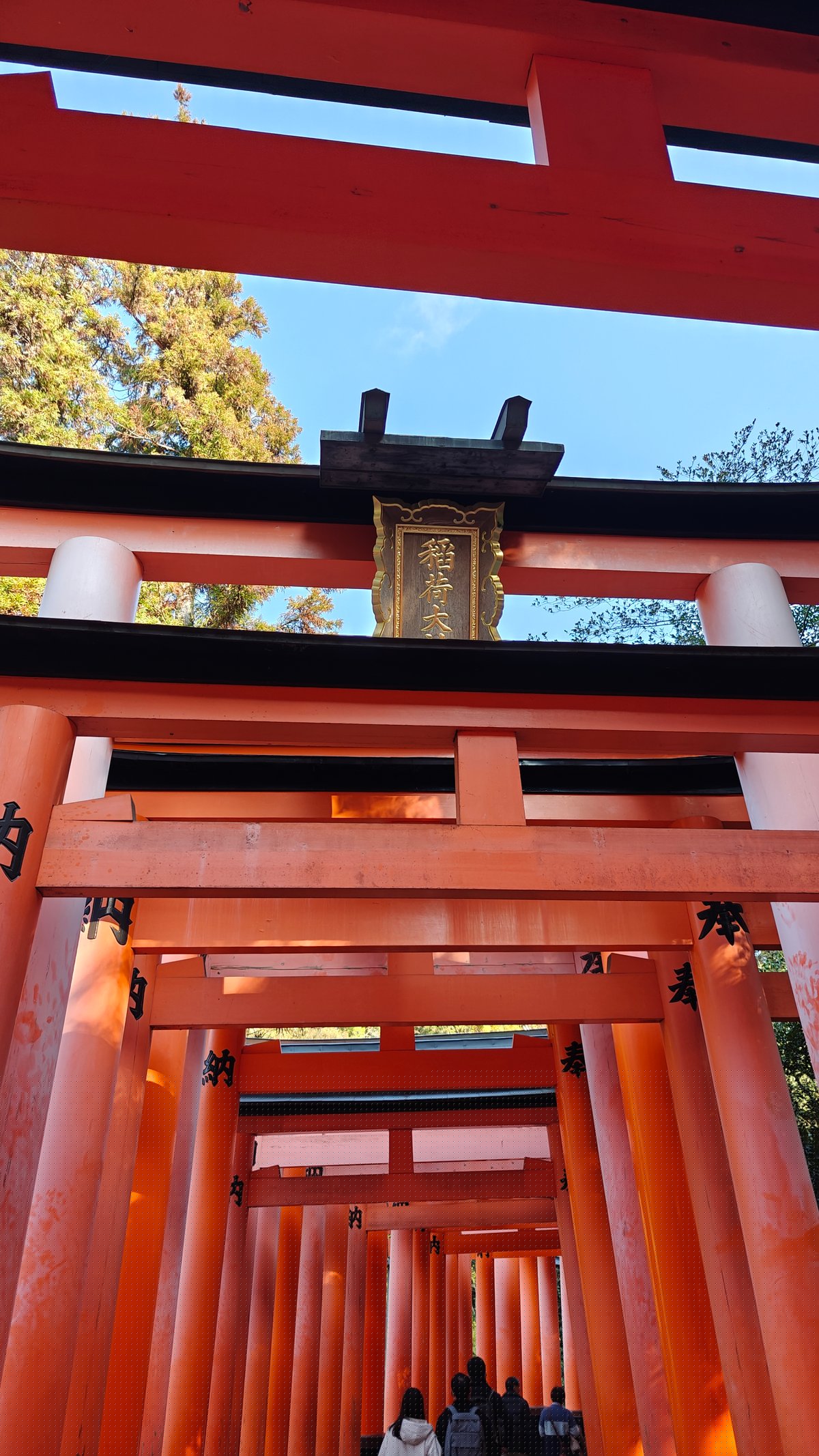 Torii with a small stone shrine at the
