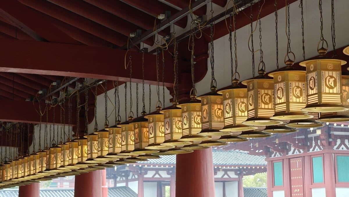 Traditional lanterns in temple hallway