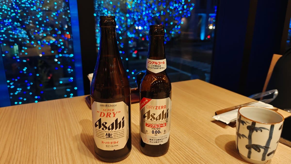 Two Asahi beer bottles (Super Dry and Dry