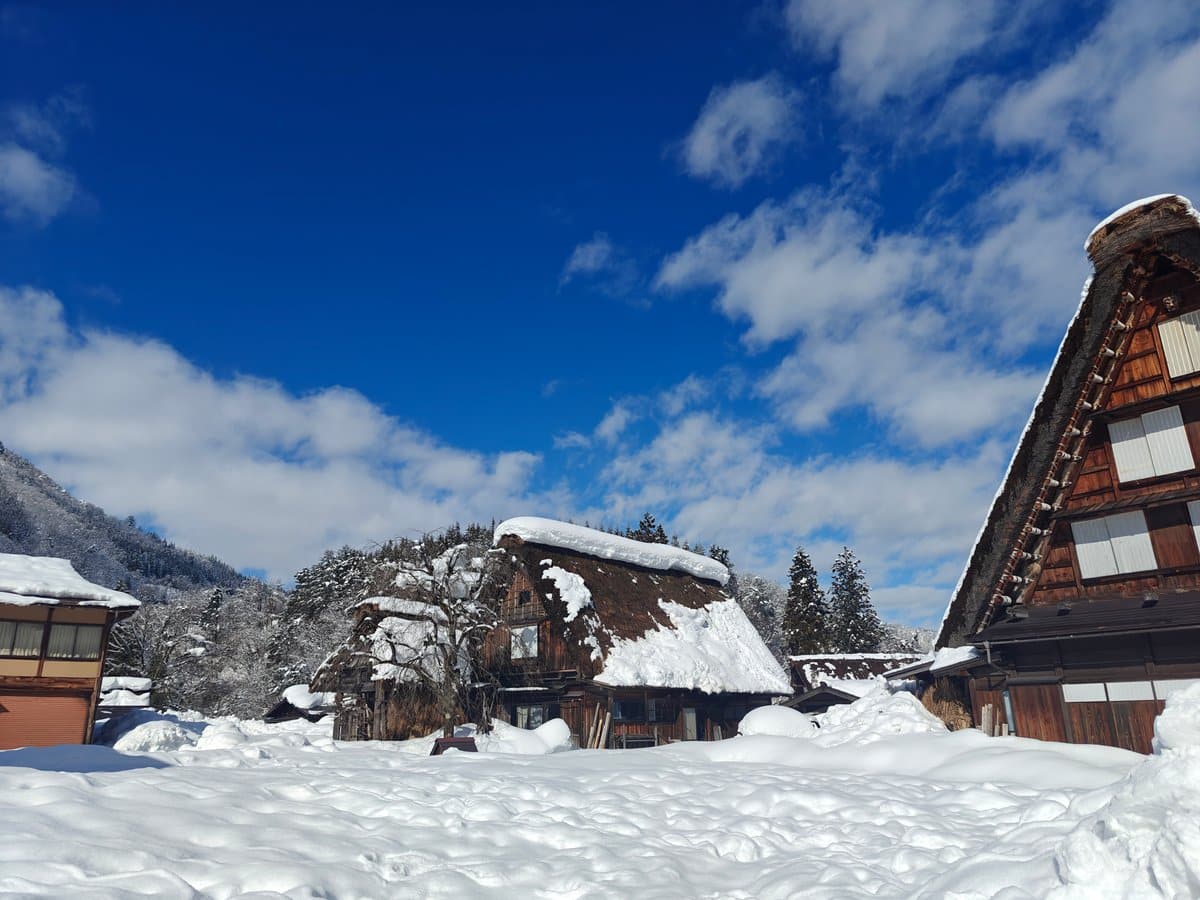 Two gassho houses deep blue sky