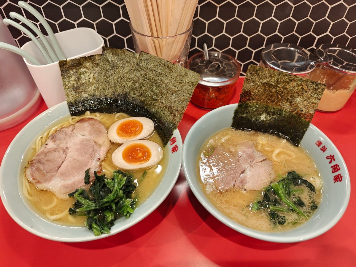 Two steaming iekei ramen bowls