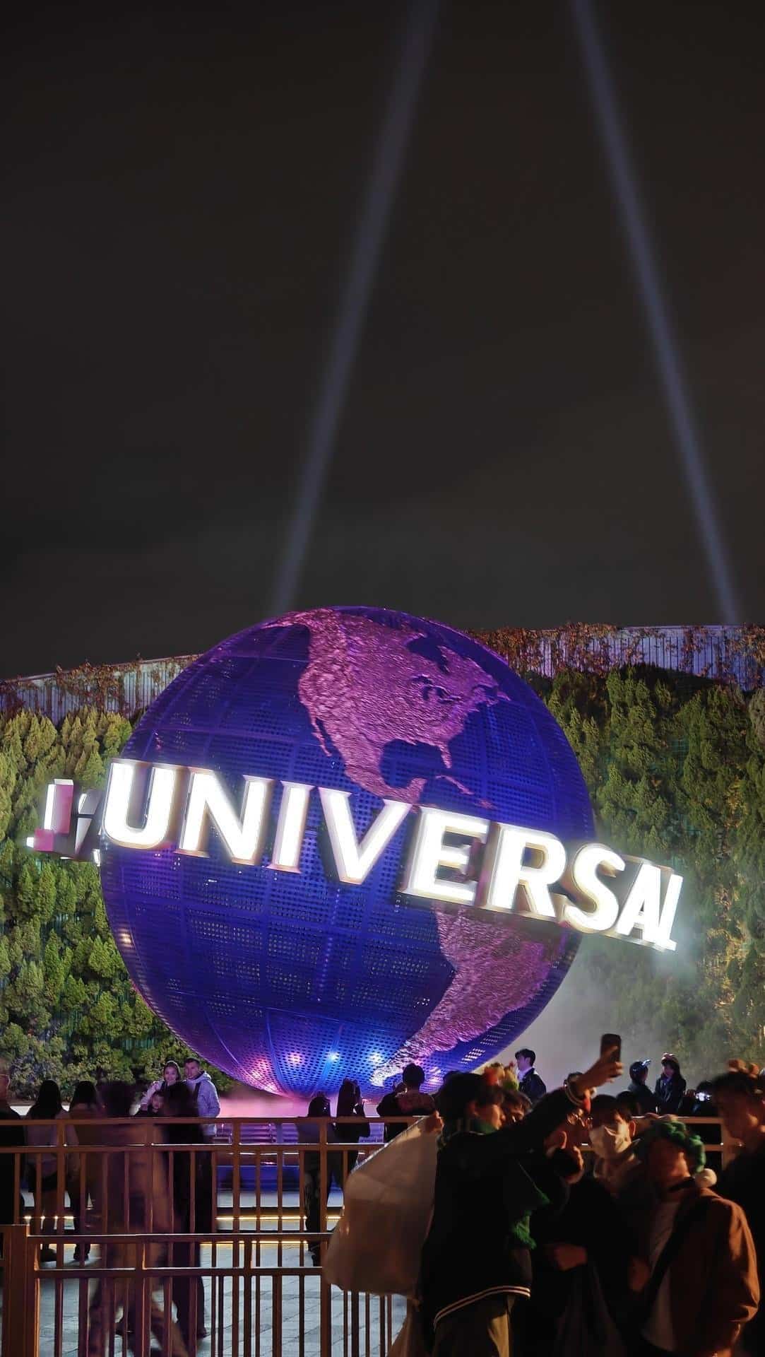 Universal globe lit at night