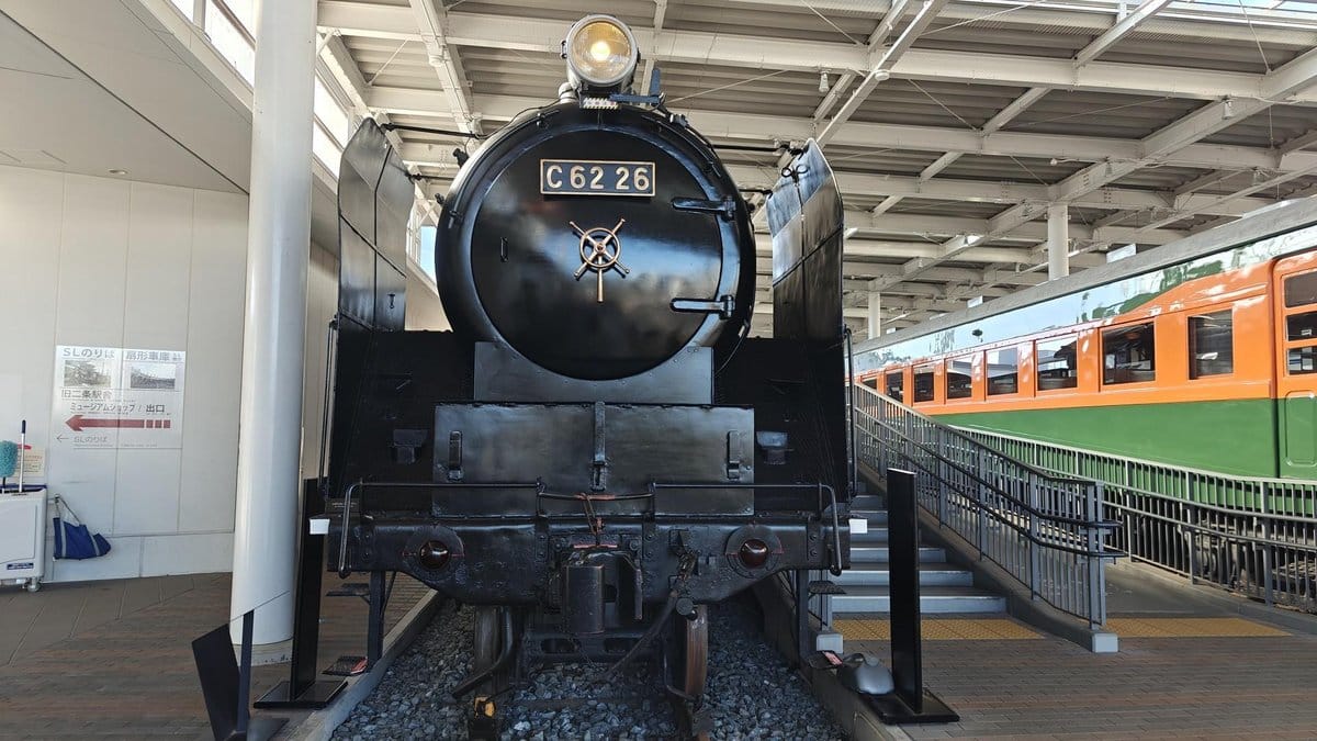 Vintage locomotive in train station