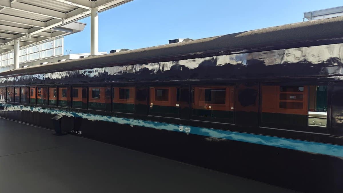 Vintage train under station roof