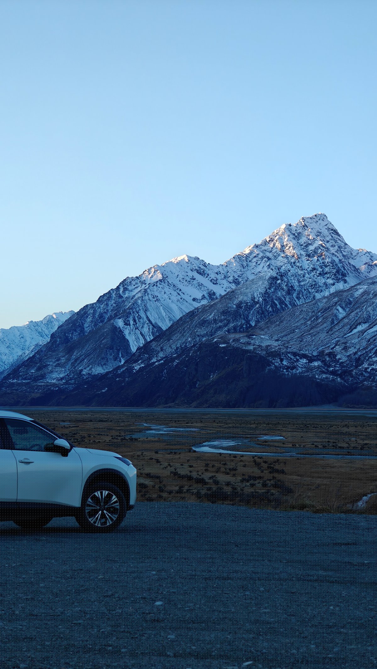 White rental SUV at scenic pullout