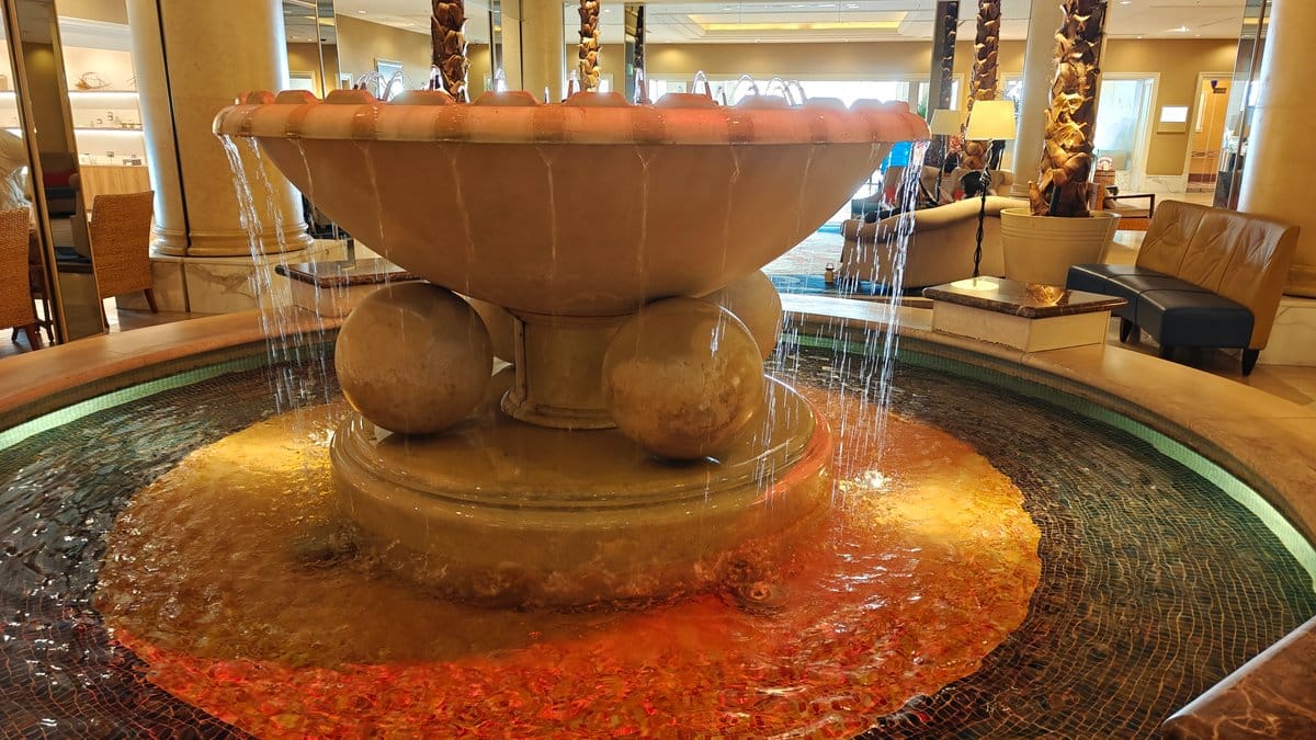 Wider view of the lobby fountain and its