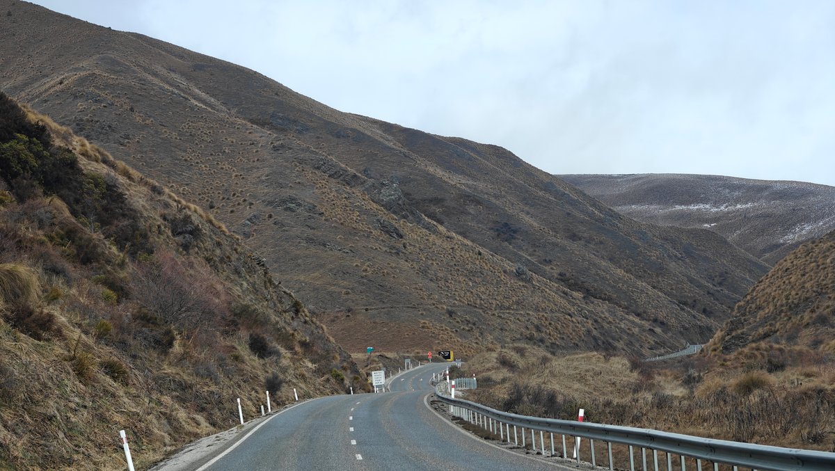 Winding highway through dry gorge