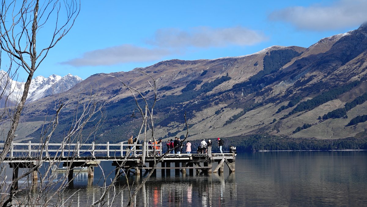 Wooden jetty reaching into lake