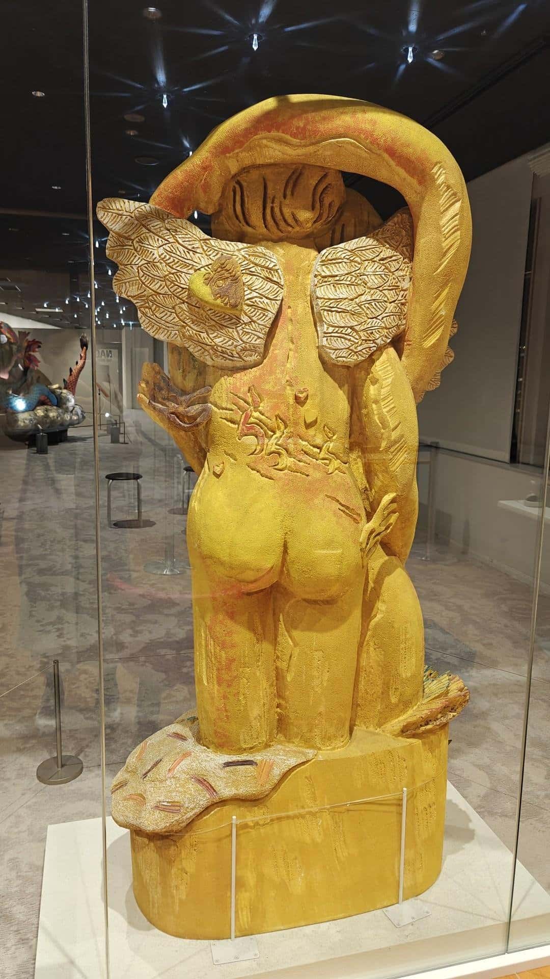 Yellow sculpture with intricate design