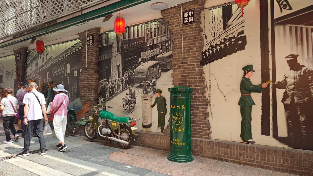 A wall mural of an old postal/soldier scene