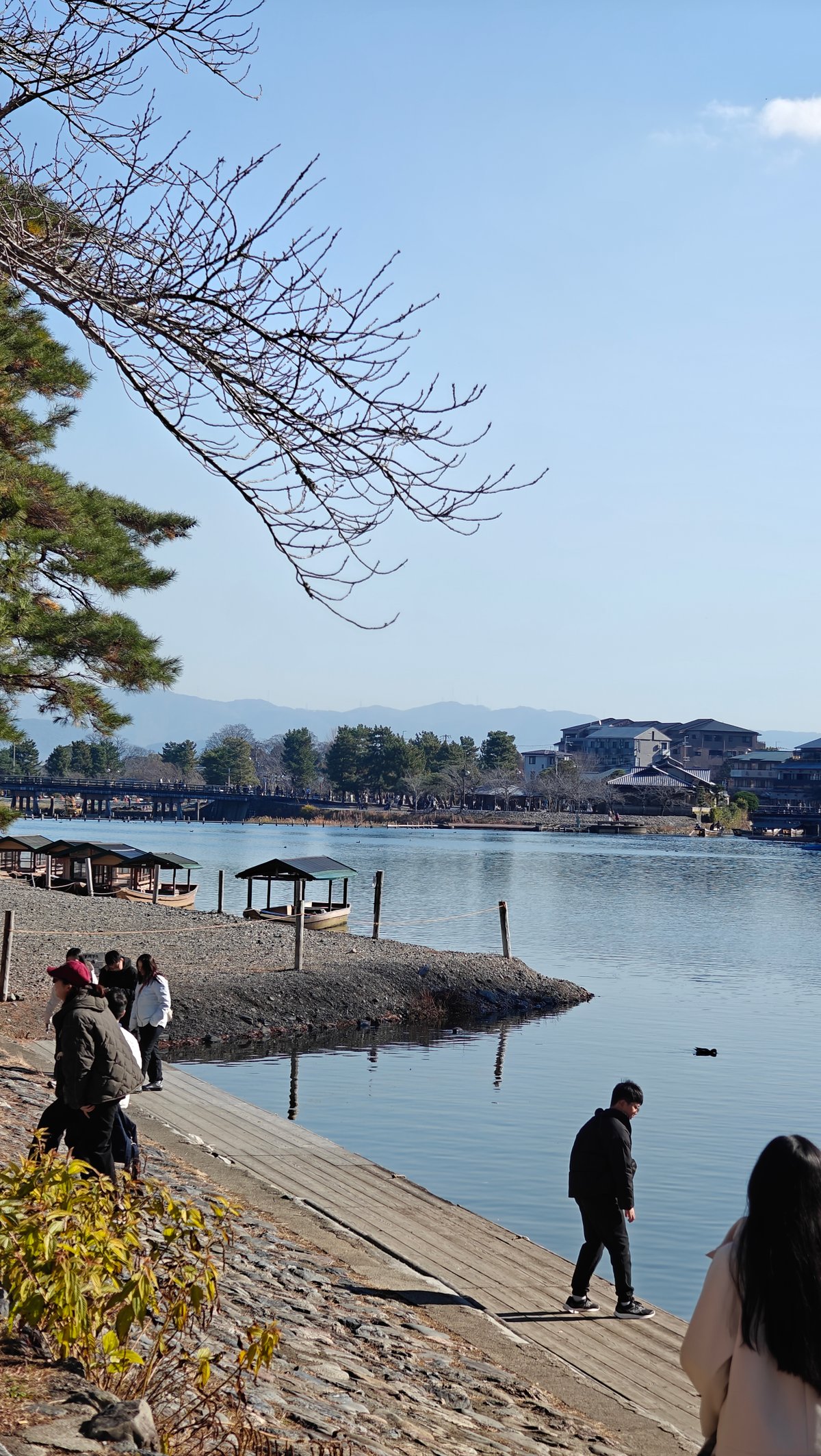 Arashiyama riverbank near boat arrival