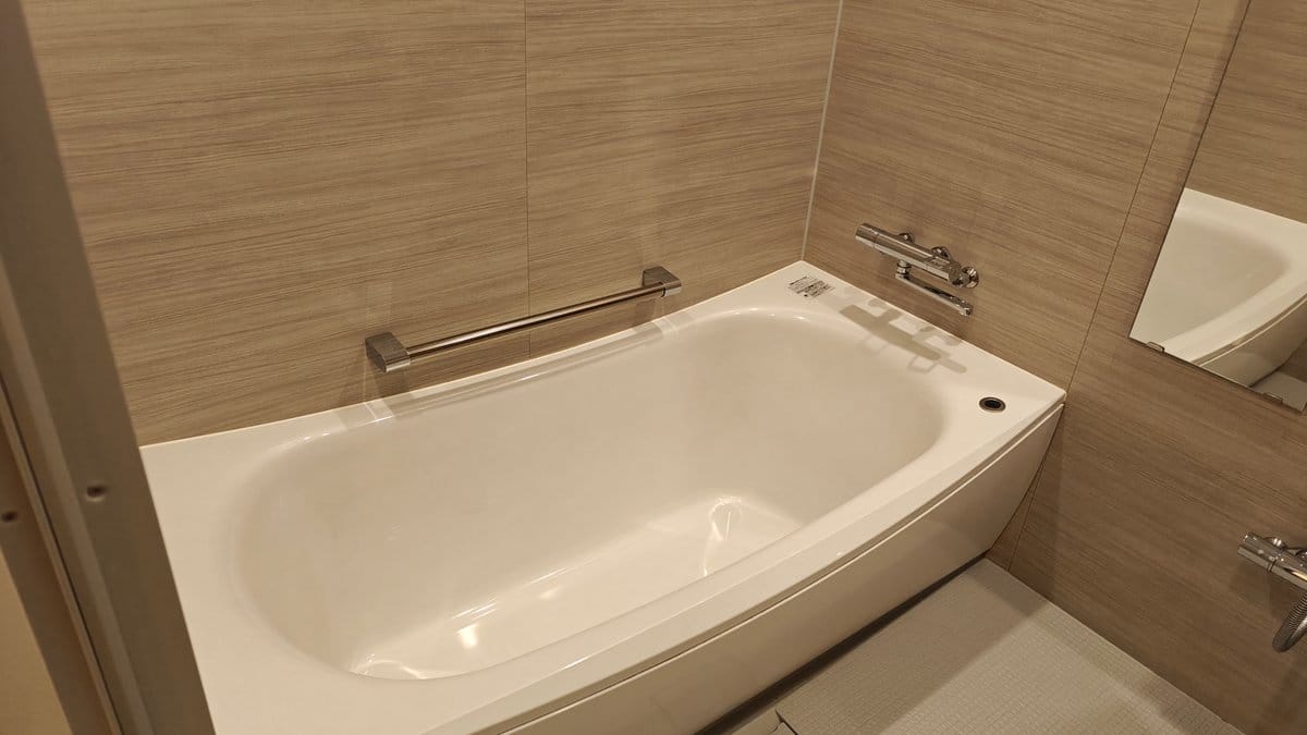 Bathtub beside the vanity