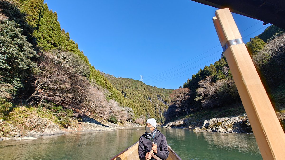 Boat bow on green mountain river