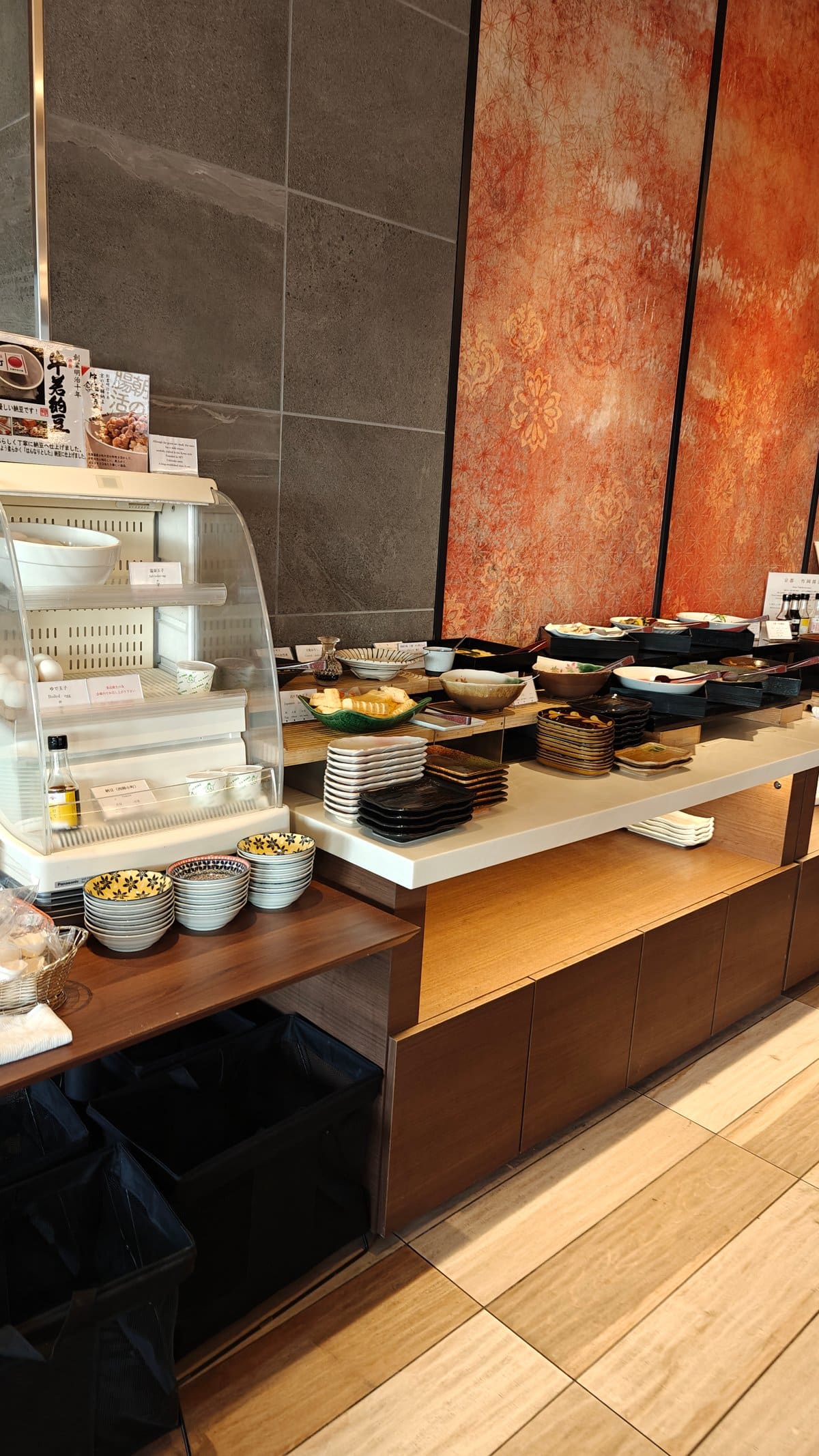 Buffet counter with dishes and the seating area