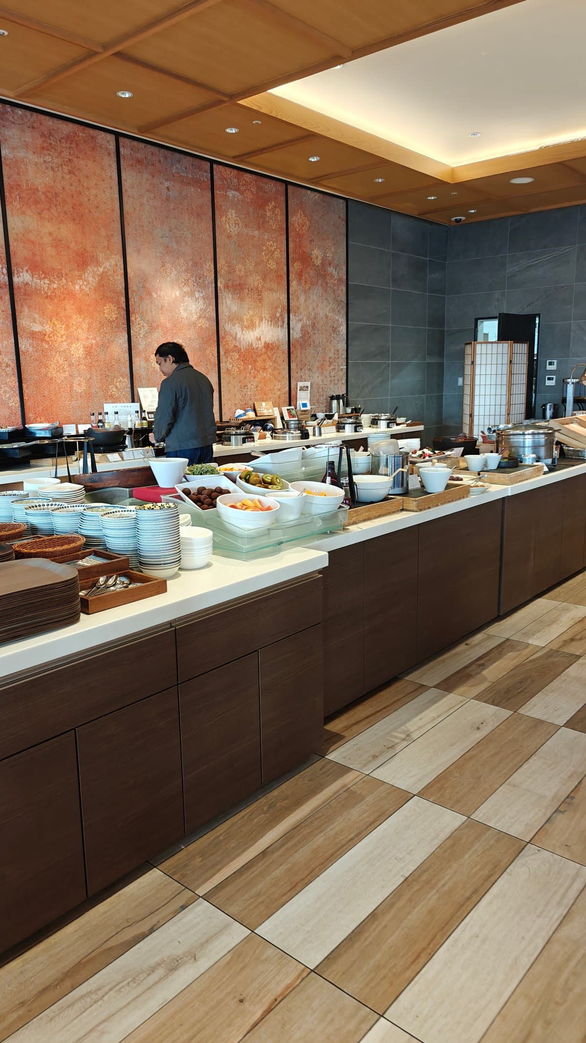 Buffet-restaurant interior with the counter and a guest