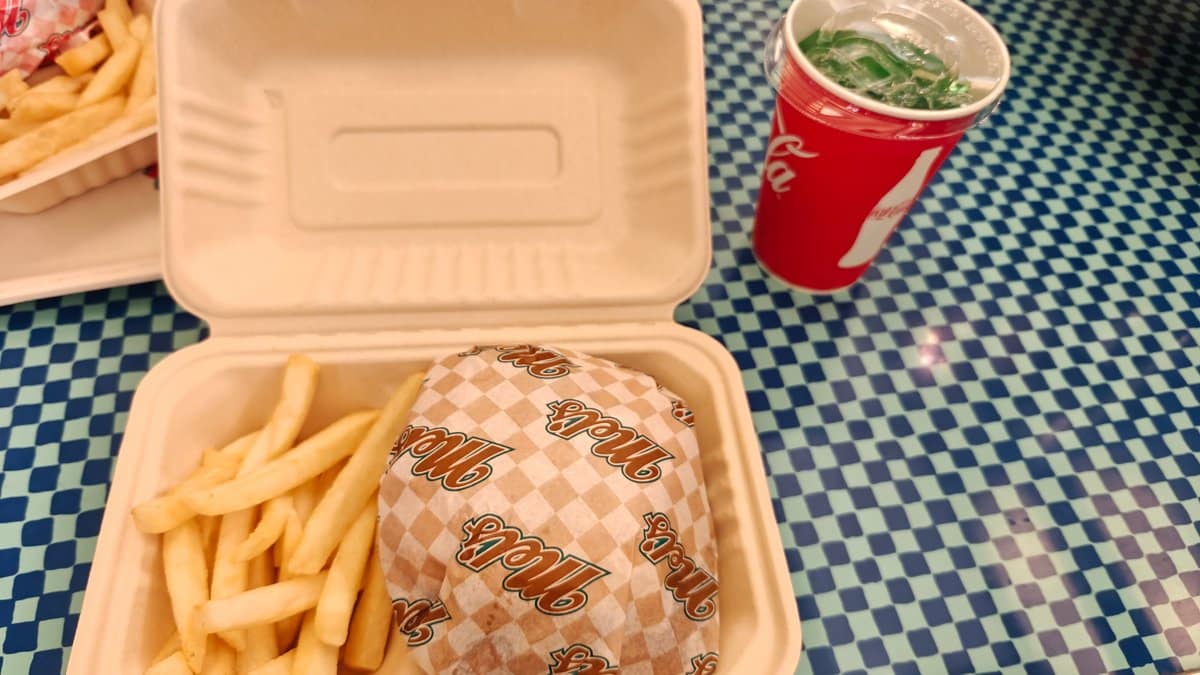 Burger meal in Mel's branded box - wrapped