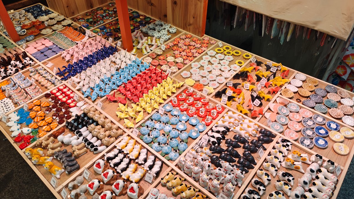 Ceramic figurine table — colorful miniature animal figures,