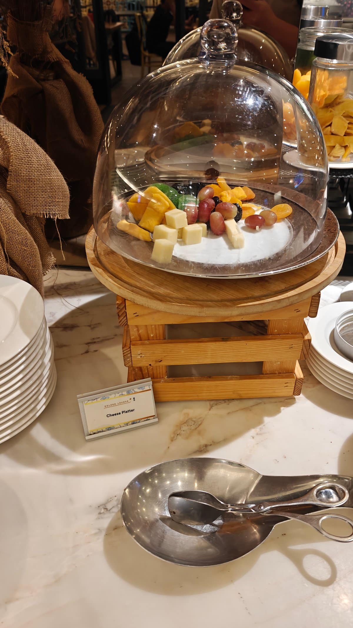 Cheese platter under glass dome