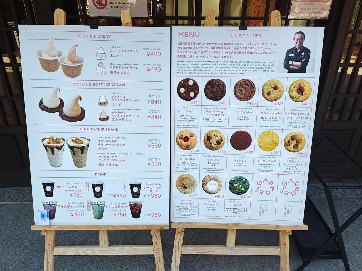 Close-up of the cafe's menu boards. Left board: