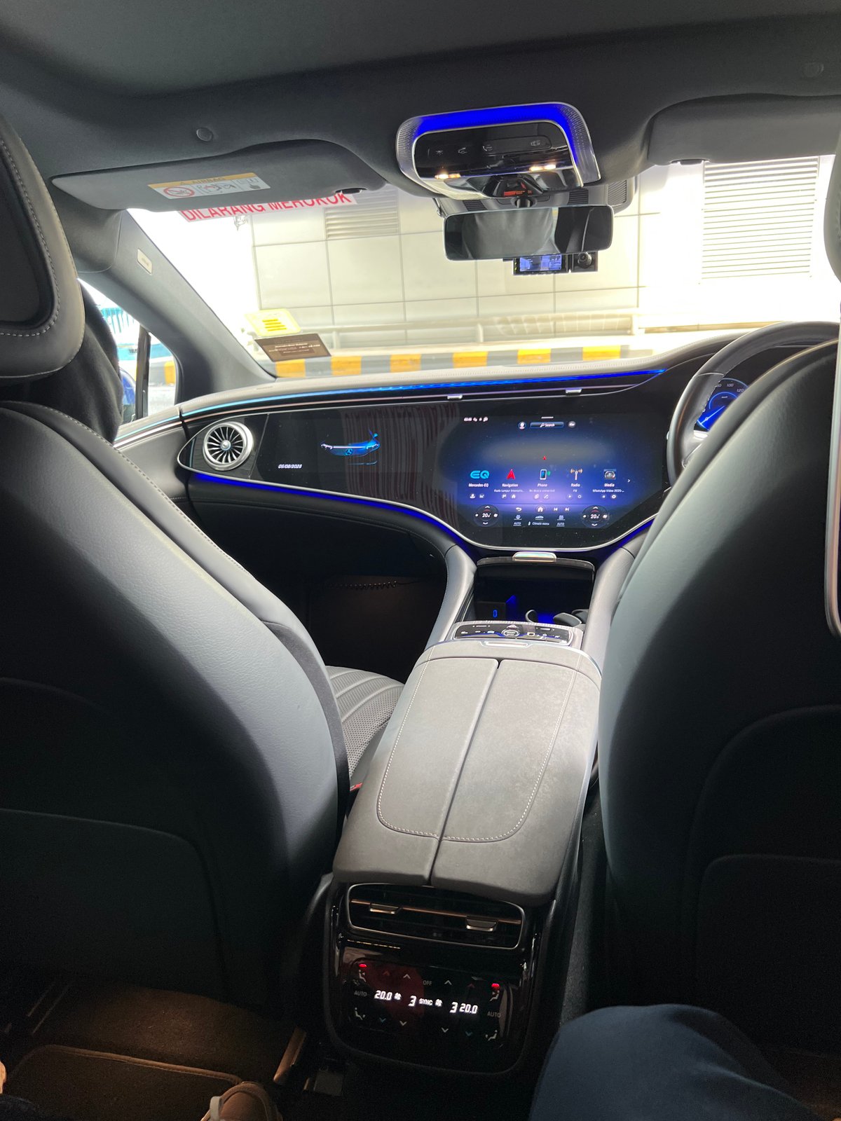 Close-up of the Mercedes-Benz EQS's wide curved digital