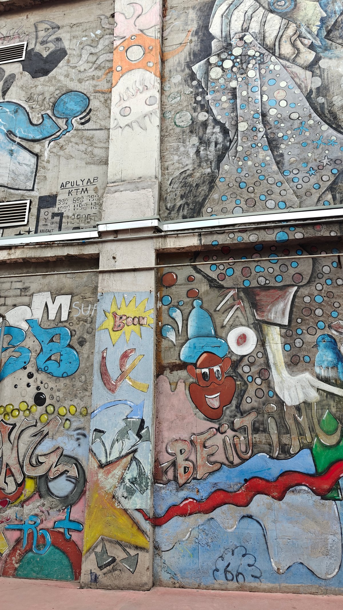 Colourful graffiti mural wall (whales and cartoon characters)