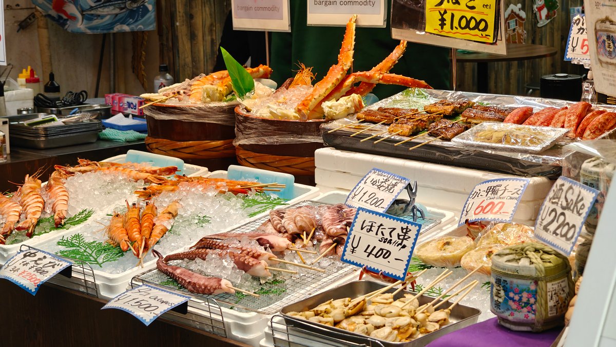 Crab legs and grilled skewers