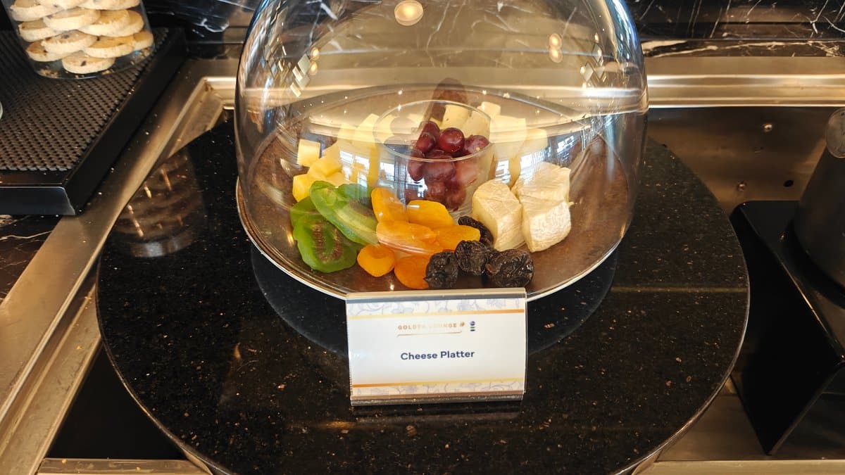 Domed cheese platter with fruits