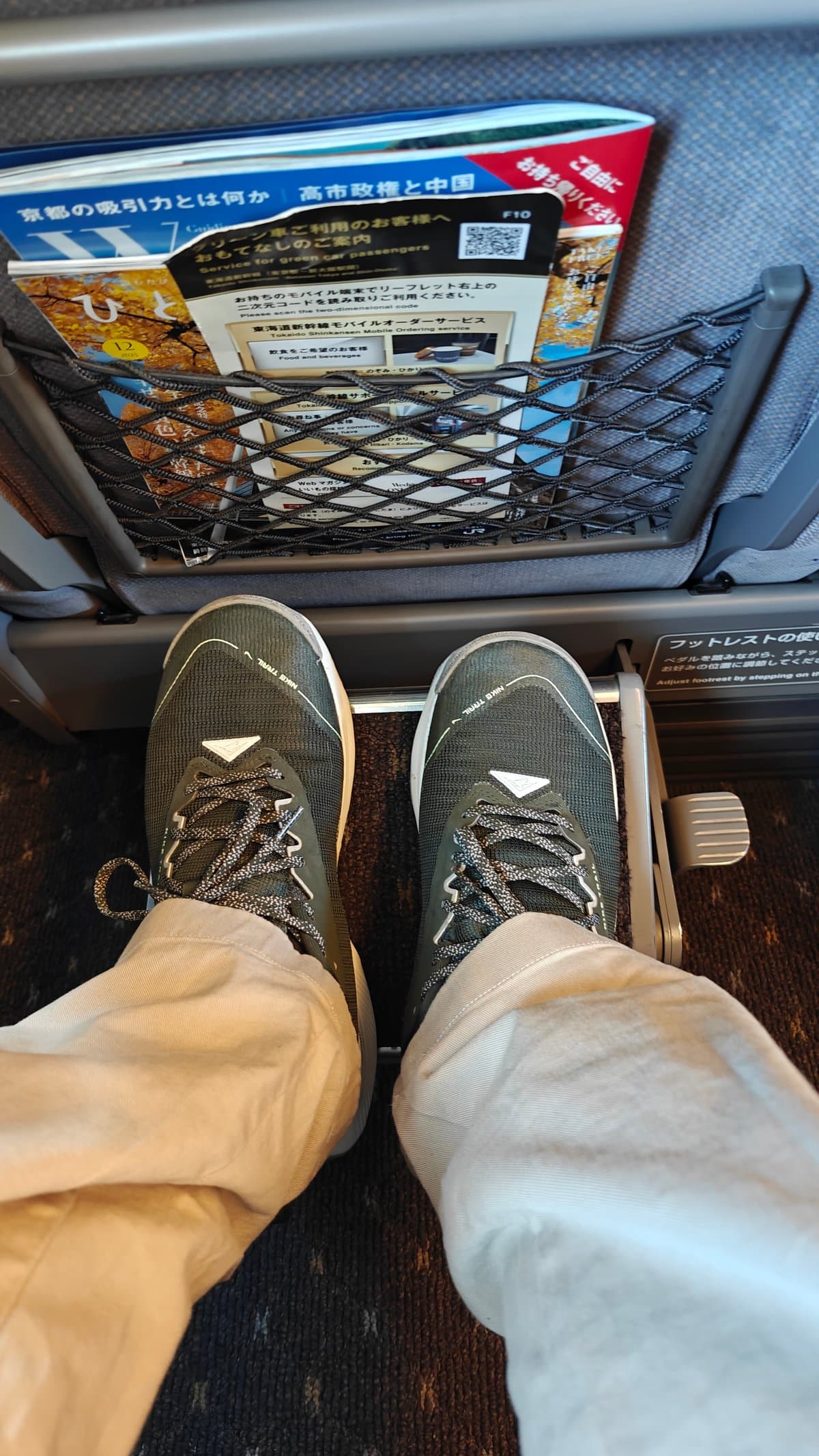Feet in the footwell showing the legroom