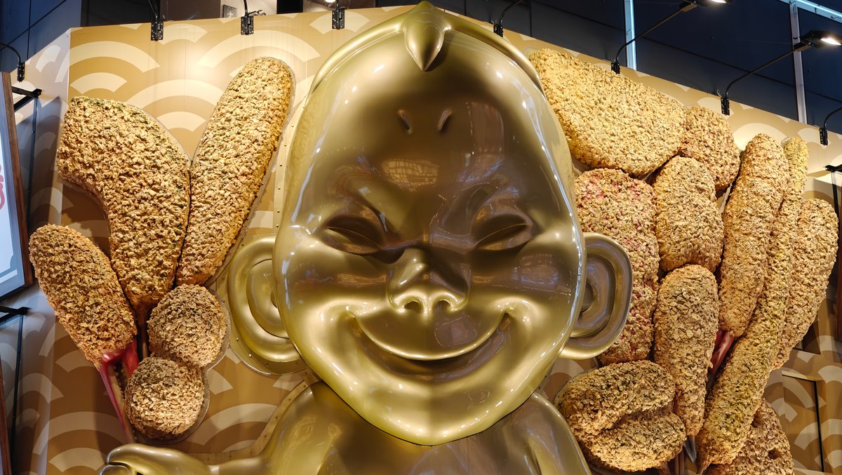 Giant golden Billiken baby face
