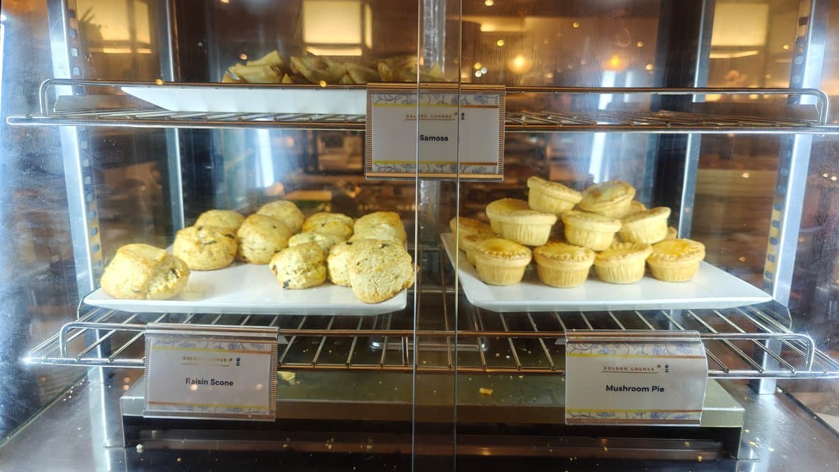 Glass display case of baked items labeled